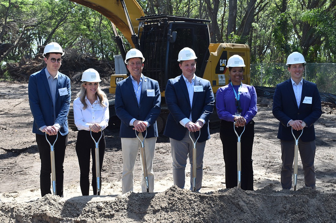Lincoln Avenue Capital employee Alex Wood, Deputy County Administrator Courtney De Pol, Commissioner George Kruse, LAC Vice President Jordan Richter, Affordable Housing Coordinator Rowena Elliott and LAC Director of Development Brandon Hodge commemorate the groundbreaking on an affordable housing project in Bradenton.
