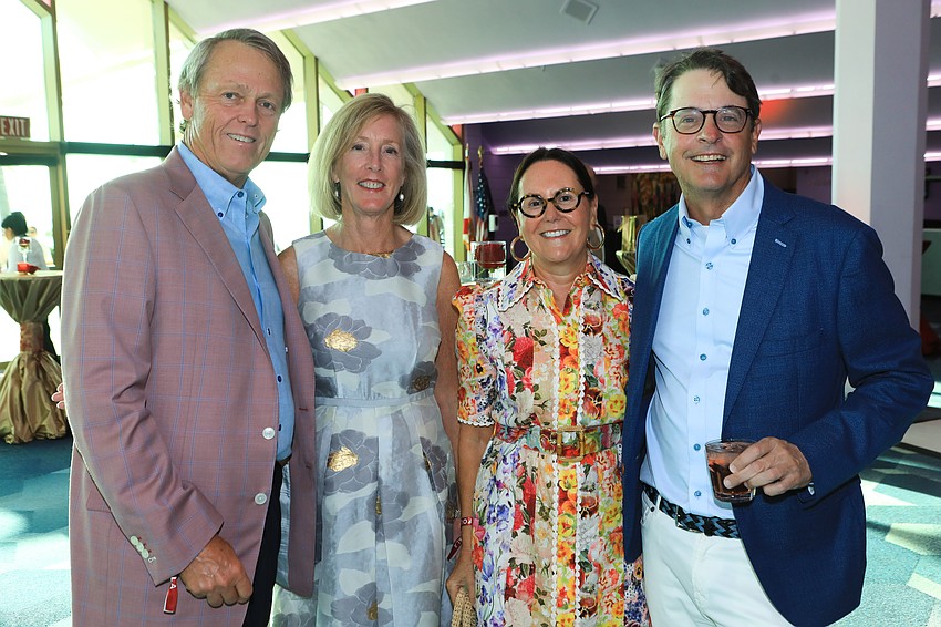 Jim and Amy Chapman with Sue and Tom Paulson