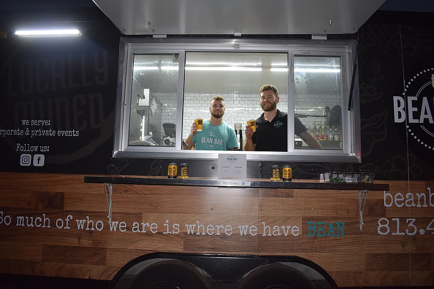 Brendon Kozicki and Kyle Trina run The Bean Bar Co. at the “Athletes & Artists Play for Kids” charity event.