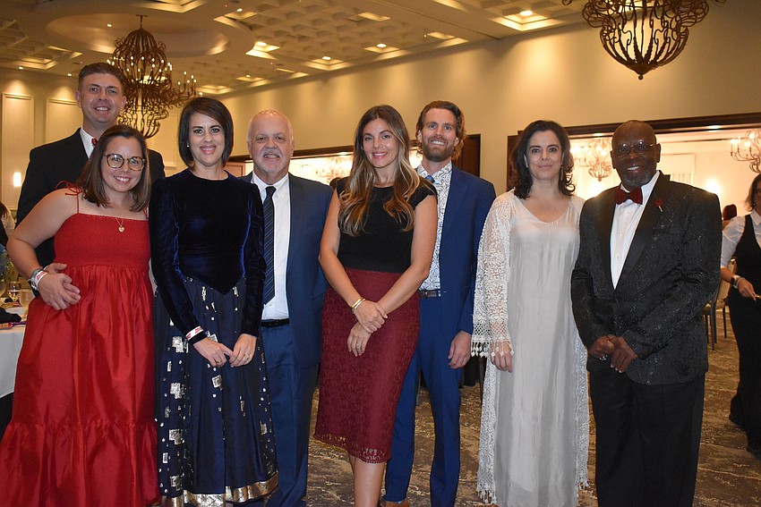 Matthew and Meredith Bombella, Mercedes Soler, Tomas Martinez, Alexis and Josh Fraser, Marie Selby Botanical Gardens Orchid Research Botanist Tatiana Arias and Marie Selby Botanical Gardens Vice President for Diversity and Inclusion Walter Gilbert.