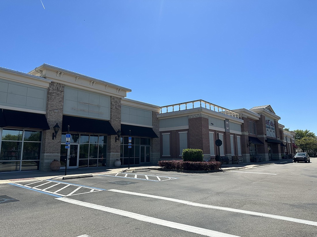 Total Wine Spirits Beer & More will expand into the closed Loop Pizza Grill space next door in St. John’s Town Center North.