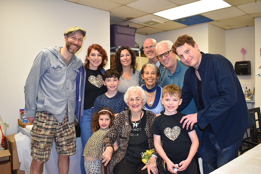 Shirley Goodman and her family joins Senior Friendship Center to celebrate her 100th birthday.