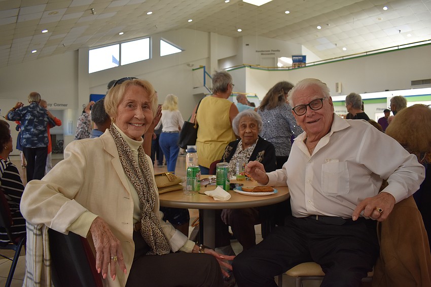Grace Thomas, Barbara Mask and Erni Thomas joins Senior Friendship Centers to celebrate Shirley Goodman's 100th birthday.