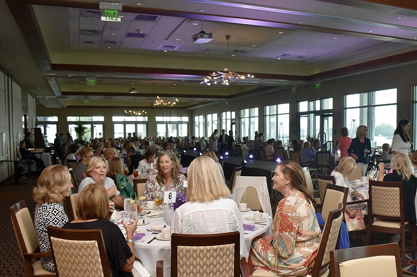 Over 200 ladies attend the Violets and Violins fashion show at the Sarasota Yacht Club.
