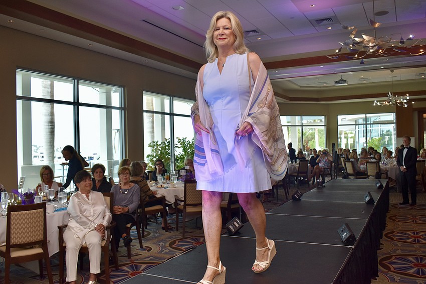 Kay Kochenderfer models an A-line dress and wrap.