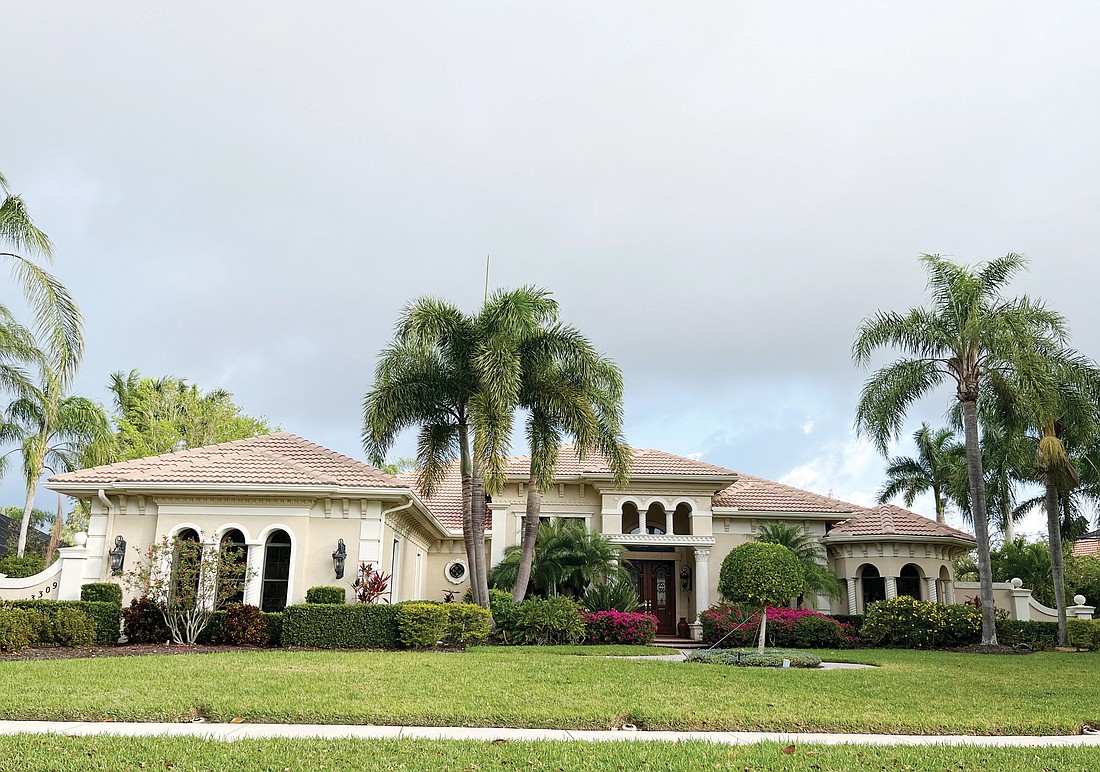 This Country Club home at 13309 Palmer Creek Terrace sold for $2.15 million.