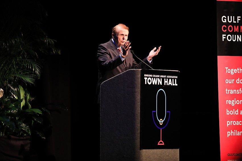 Larry Thompson addresses the crowd.