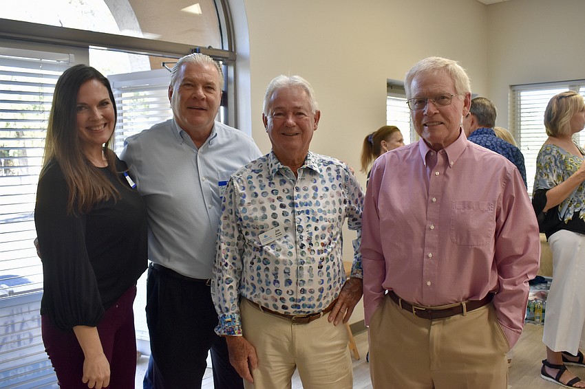 Robin Nystrom, Rick Konsavage, Jim Brown and Mayor Ken Schneier
