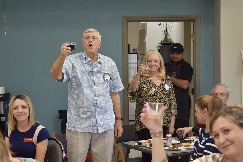 Bob Gault toasts to Michael Garey's leadership.