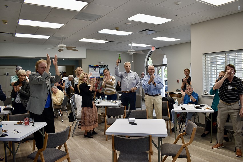 Kiwanis President Michael Garey receives a standing ovation from the club.