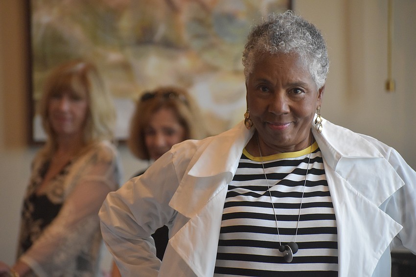 Besides walking the runway as a model, Nedra Clark says she looks forward to doing some shopping because the Evelyn and Arthur clothes would be available after the show.