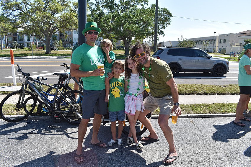 Sarasota's Jordan Twyford, 3-year-old Hank Twyford, and  7-year-old JJ Twyford, and Orlando's 10-year-old Junia Hardie, and Art Hardie