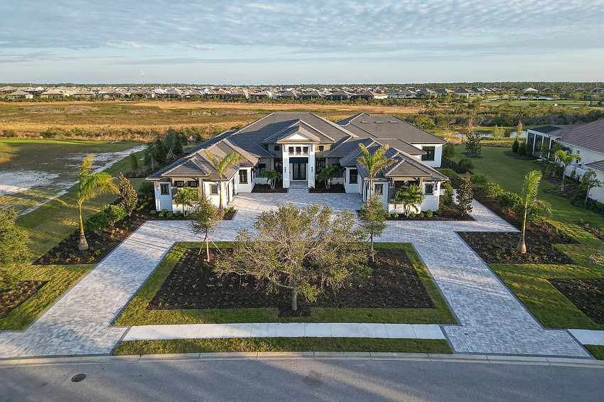 Realtor Stacy Haas of Michael Saunders & Company announced the sale of a $5.15 million Lake Club home on Tuesday.