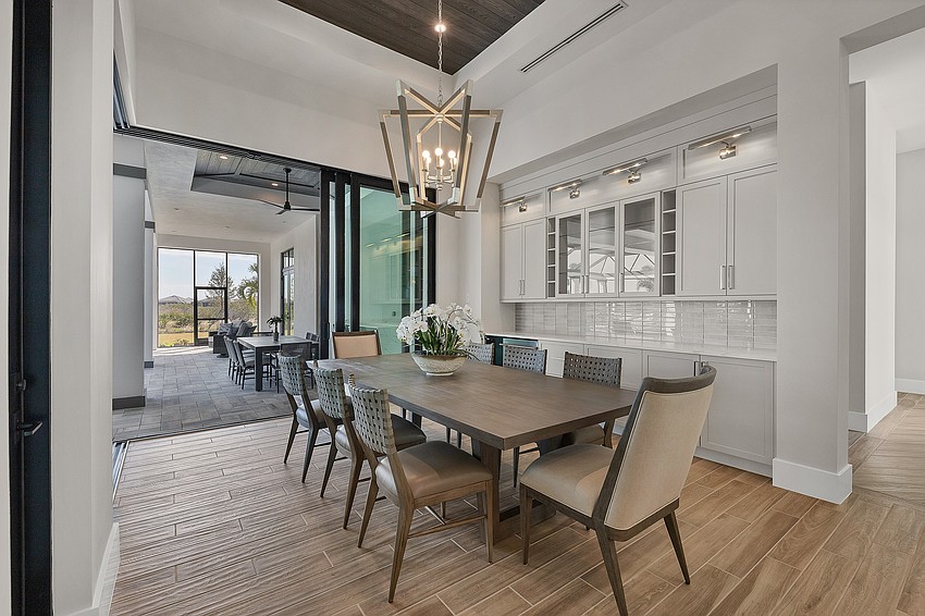 The elegant home has plenty of dining options for special occasions.