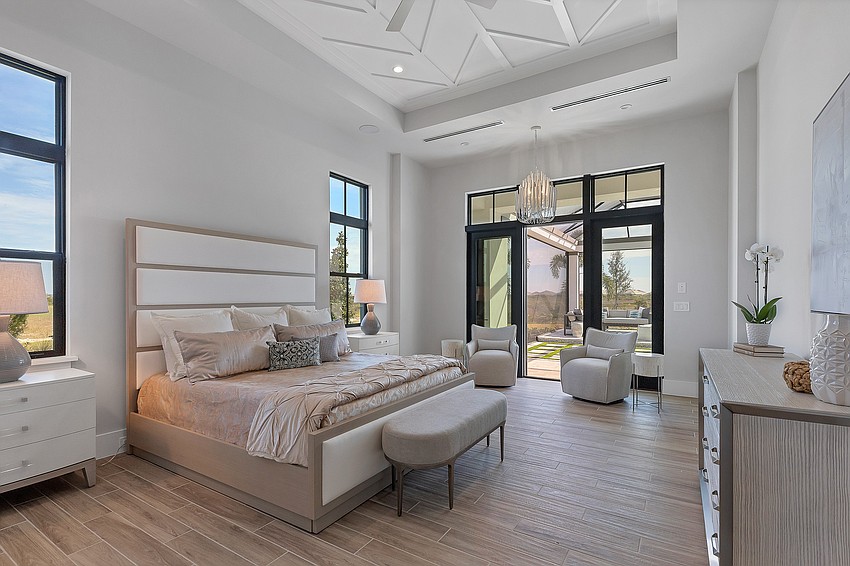 The many custom features include an elegant master bedroom.