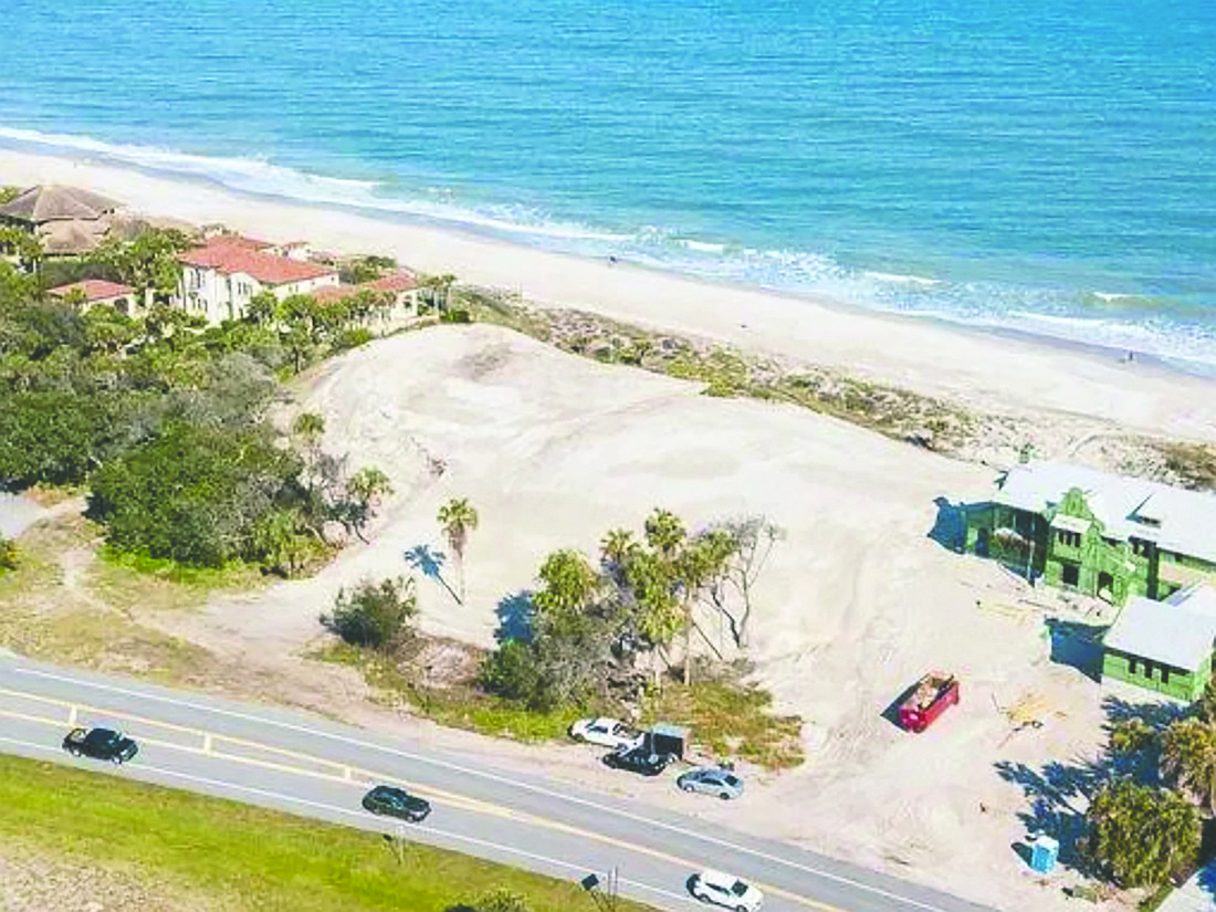 Oceanfront lot approximately 150 feet by 400 feet south of Mickler’s Landing.