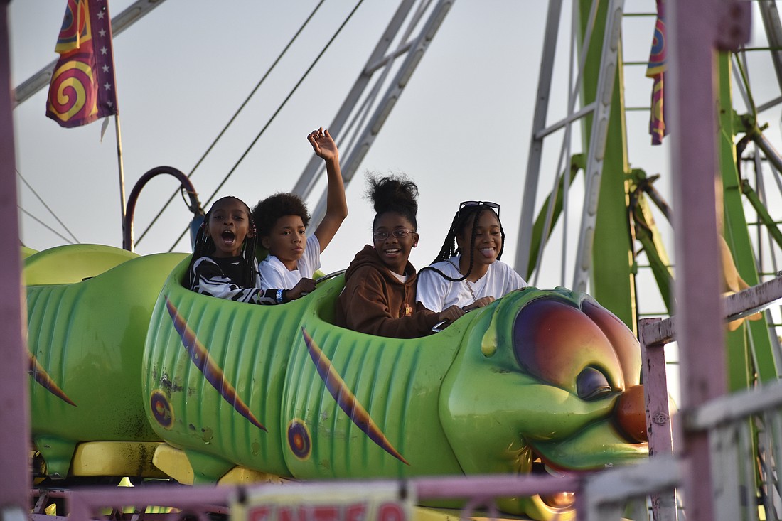 10-year-old Kylie Ung, 12-year-old Isaiah Edwards, 11-year-old Isariah Edwards and 13-year-old Isaialyah Edwards at the 2023 Sarasota County Fair.