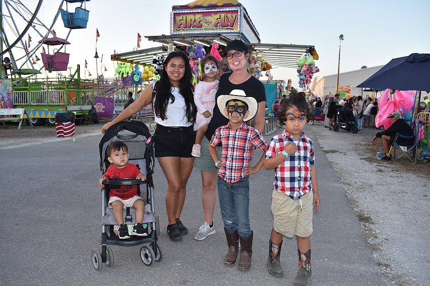 1-year-old Xerxes Miller, Raquel Miller, 2-year-old Zaria Miller, Michelle Weaver, 6-year-old Xander Miller, and 4-year-old Xaler Miller