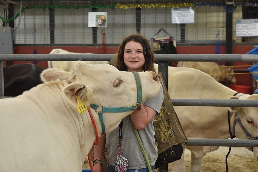 12-year-old Jocelyn Carter and her cow Blizzard