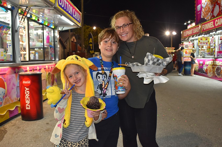 7-year-old Ruby Ruza, 8-year-old Hunter Ruza, and Stephanie Franchi