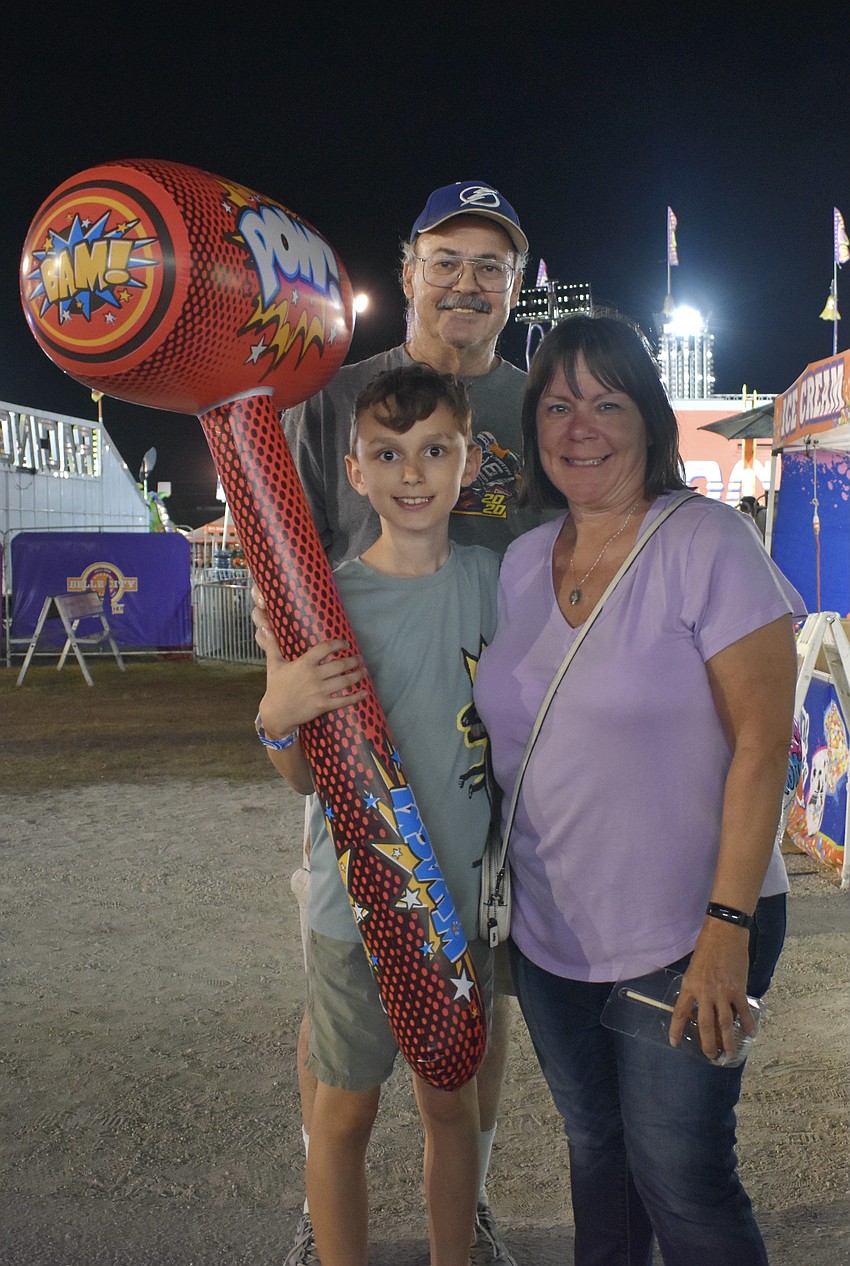 10-year-old Jackson Rapean and Rich and Cindy Rapean