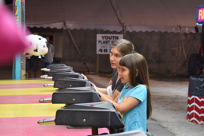 Mercedies Espina and 8-year-old Isabel Espina