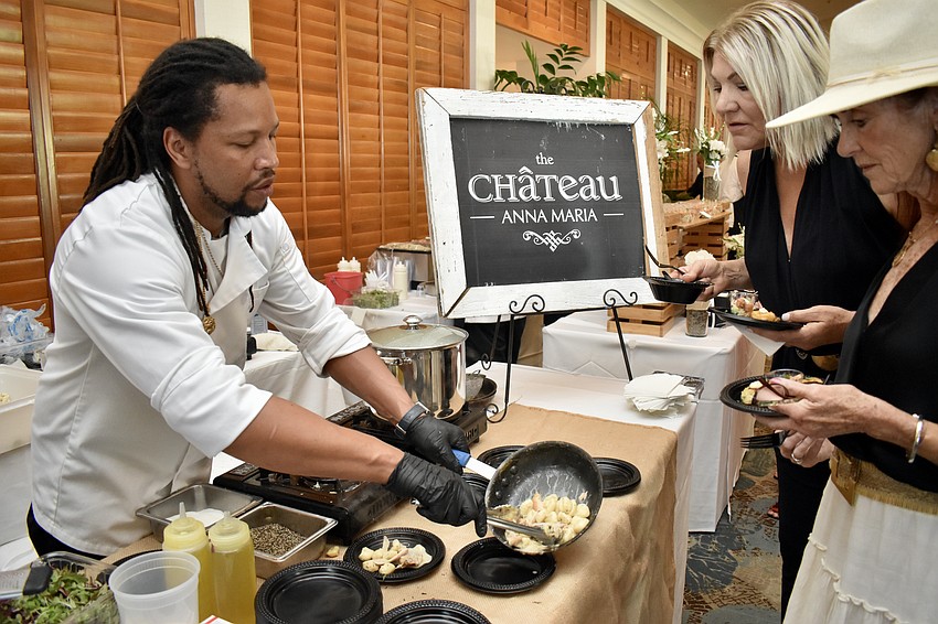 Tye Crain plates the braised rabbit with gnocchi and black truffles from The Chateau Anna Maria.
