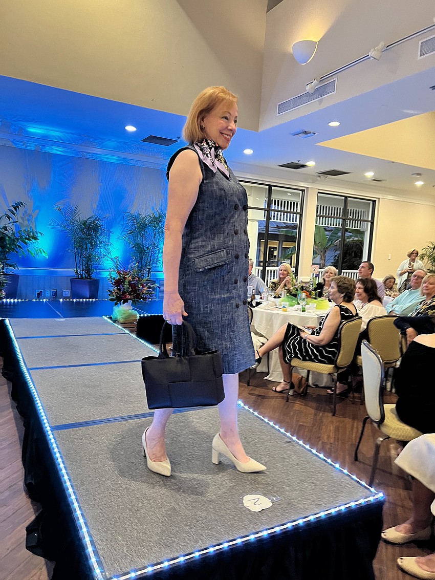 District 2 Commissioner Penny Gold struts the catwalk at the Longboat Key Club.