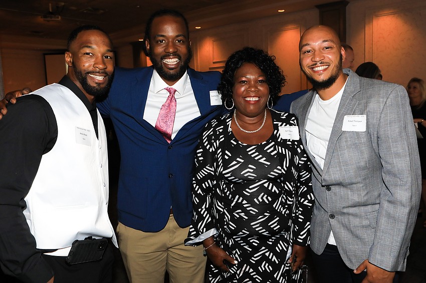 Antorio Rooks, Courtney Benton, founder April Glasco and Robert Thompson
