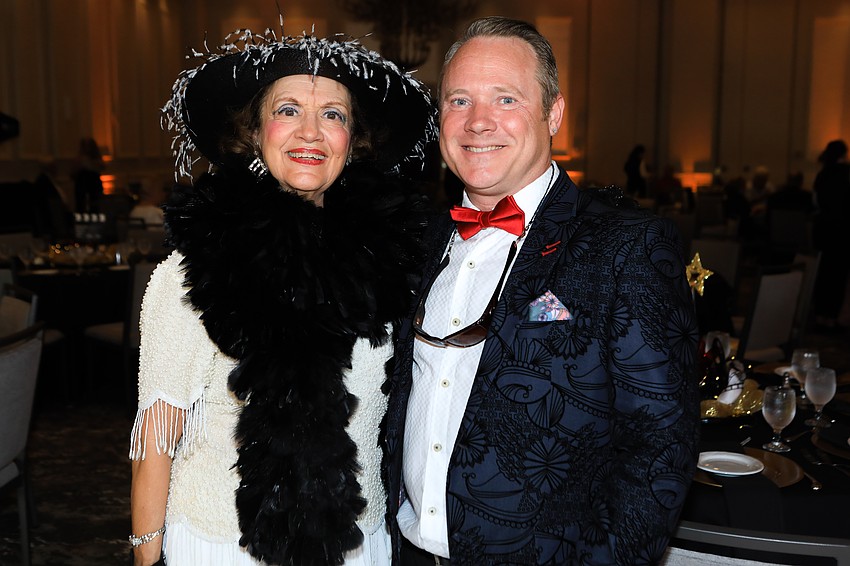 Kathryn Chesley and Will McCallister take on some throwback looks.