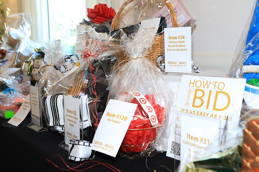 Guests bid on silent auction items.