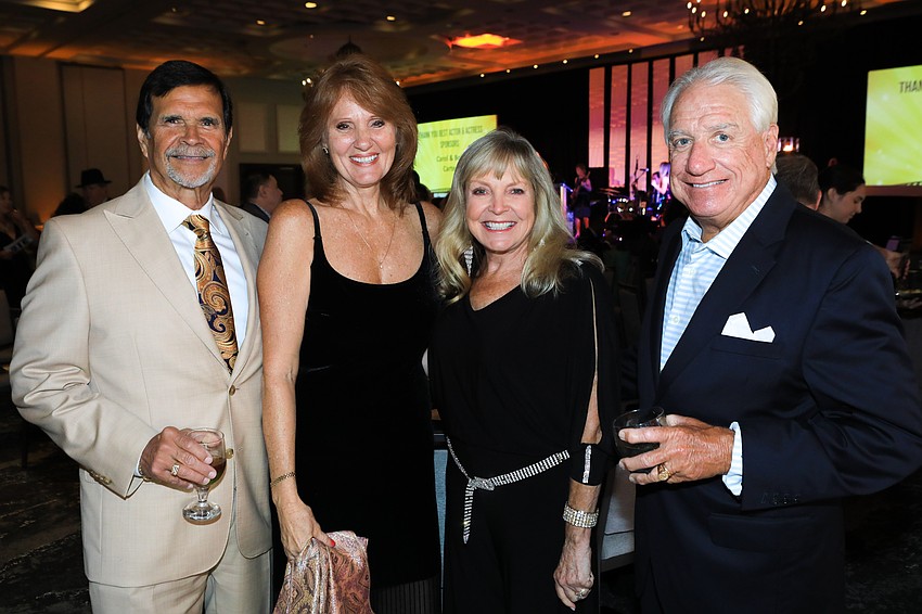 Bob Revels, Tracy Vita, Veenie and Mark Goodson dressed elegantly for the evening affair.