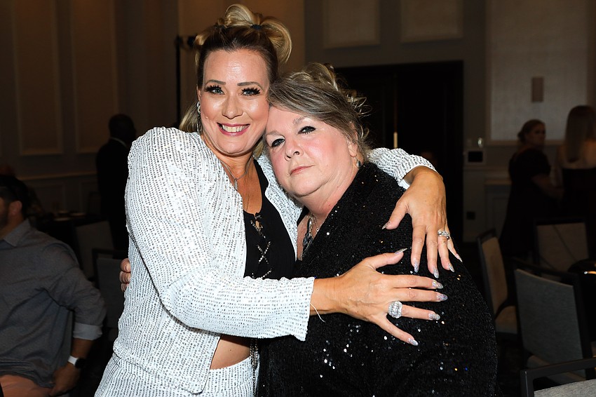 Lynn Turner and Lisa Barnott both sported some dazzling sequined attire.