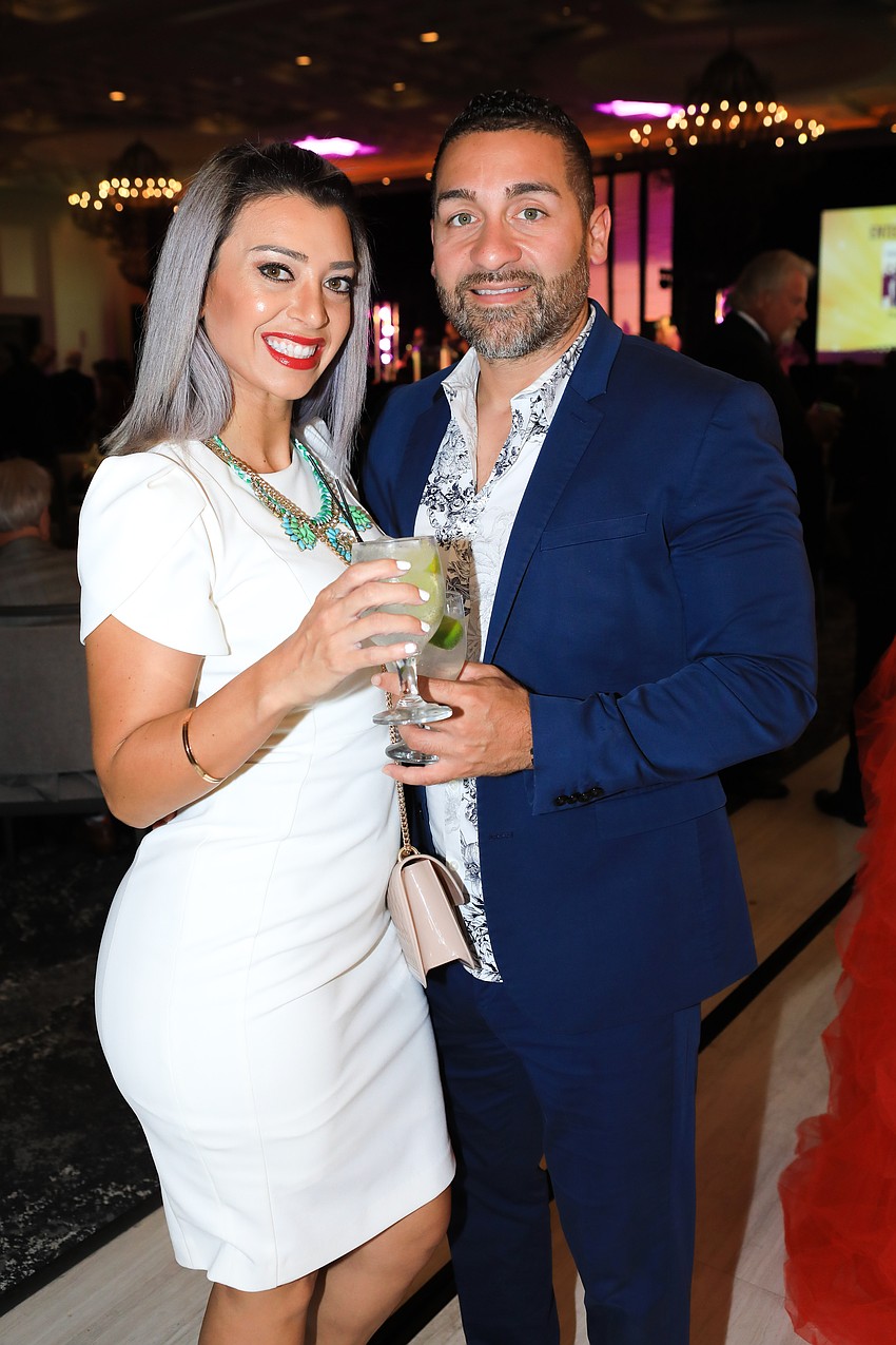 Julieta and Elvin Oyola dress their best for Tropical Nights.