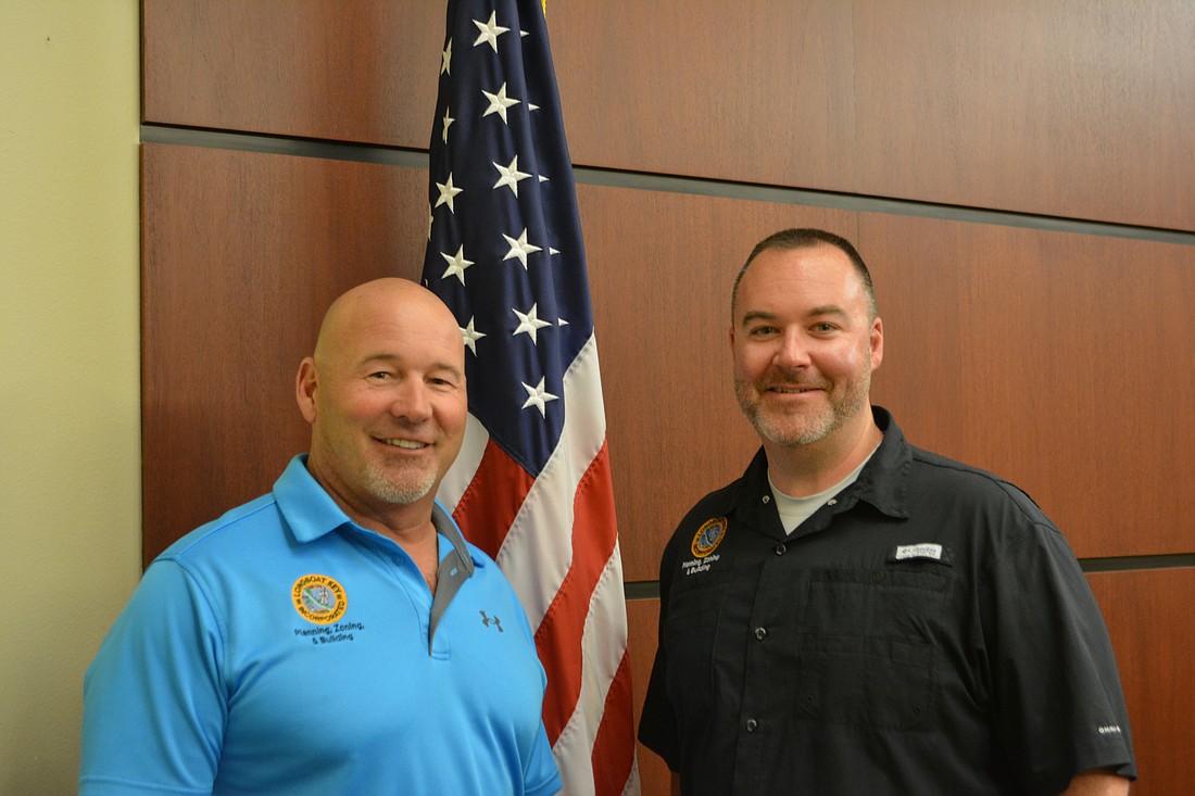 Bryan Wisnom and Chris Kopp worked together in the town's code enforcement department for four months.