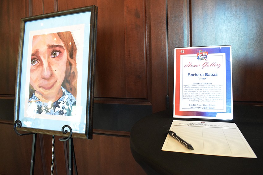 Braden River High School's Barbara Baeza has her artwork auctioned off at Arts Alive.