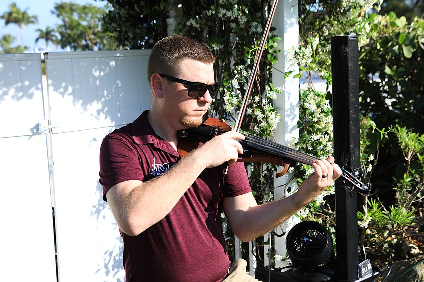 Guests enjoyed violin music.
