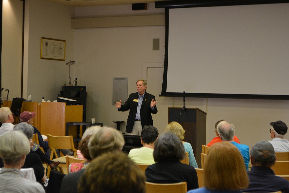 County Commissioner Mark Smith addresses audience members at a Miracle on the Key Town Hall Tuesday afternoon.