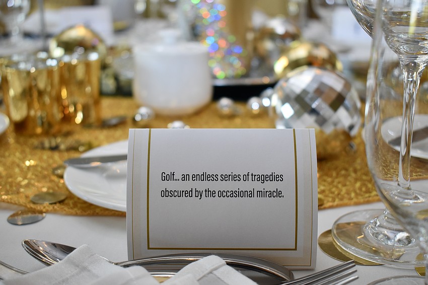 Each table setting gets a funny golf quote.