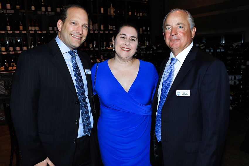 Tom and Courtney McLaughlin with Ed Griese