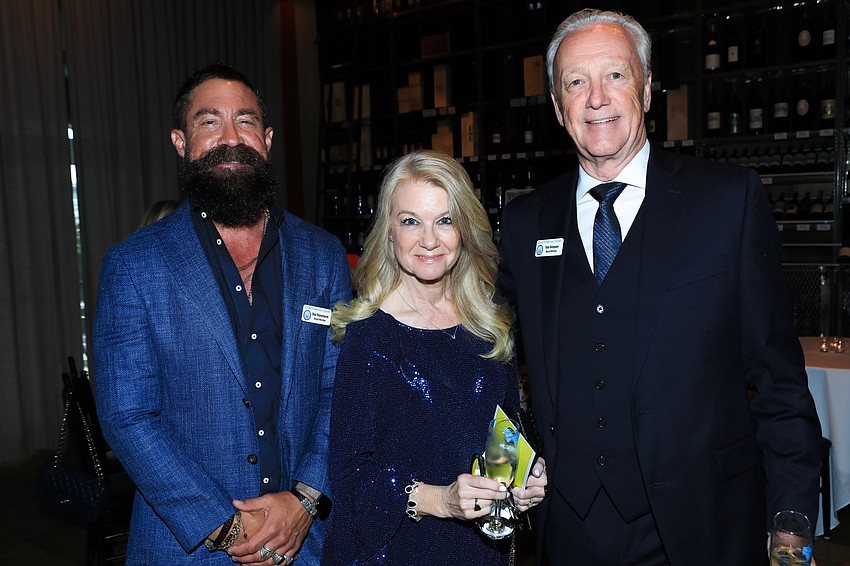 Dan Starostecki with Carol and Tom Dempsey