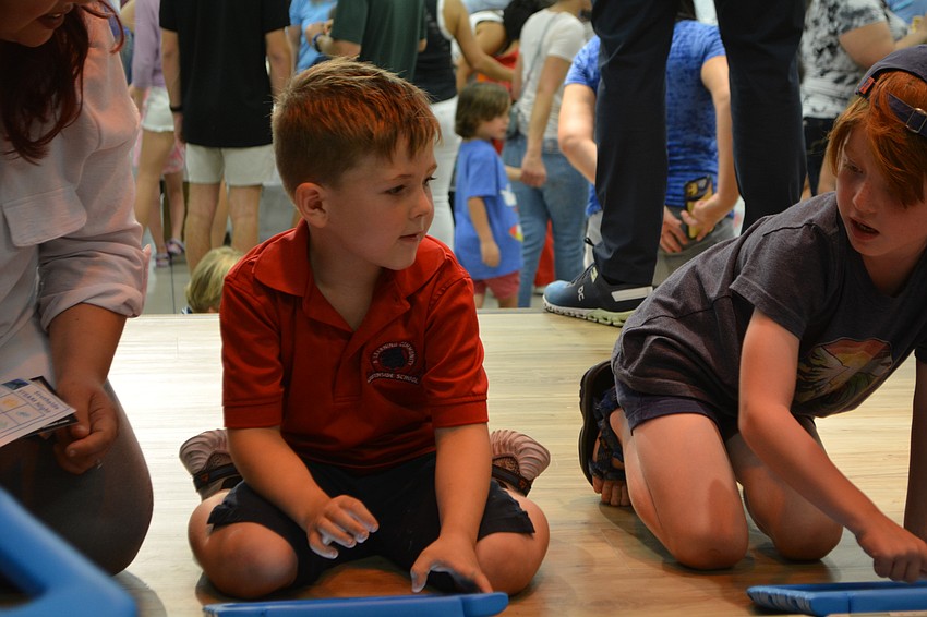 Lucas Gutherz, a kindergartner at Southside Elementary, uses an iPad to 