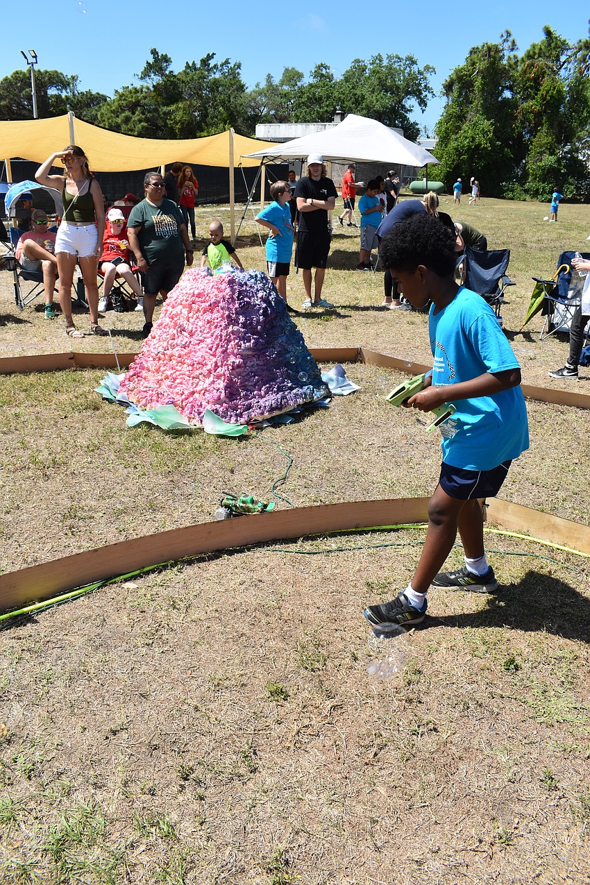 10-year-old Louie Goncalves of the team Da Flop navigates a series of sea sponges in the obstacle course.