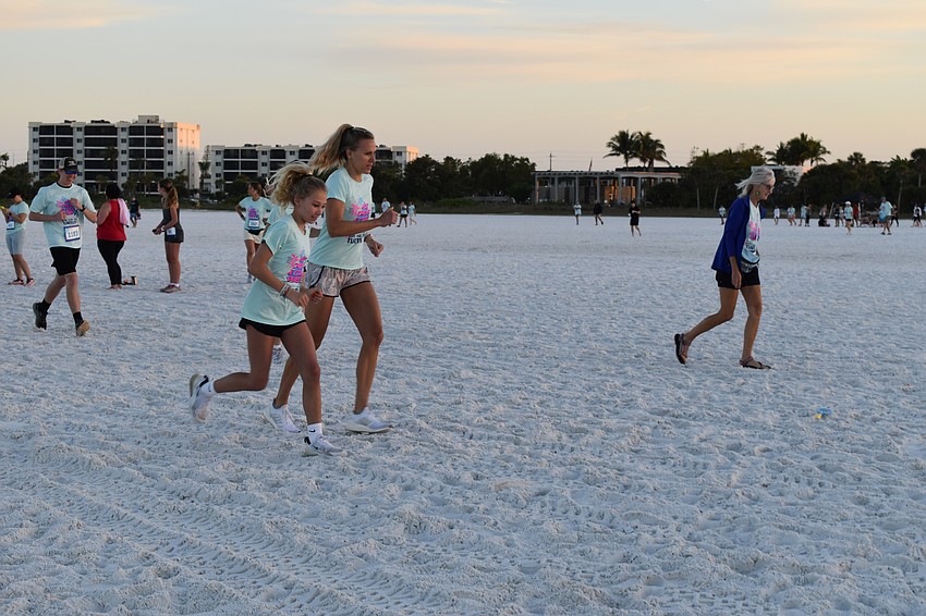 13-year-old Brileigh Babcock and Stasha Babcock set out on the 1-mile run.