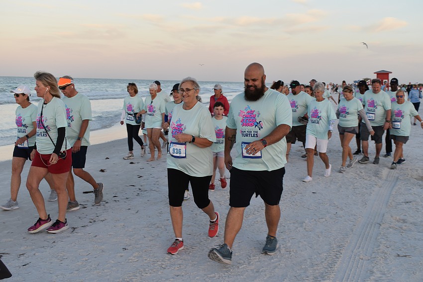Nel Johnston and Michael VanCuren make a start on the 1-mile race.