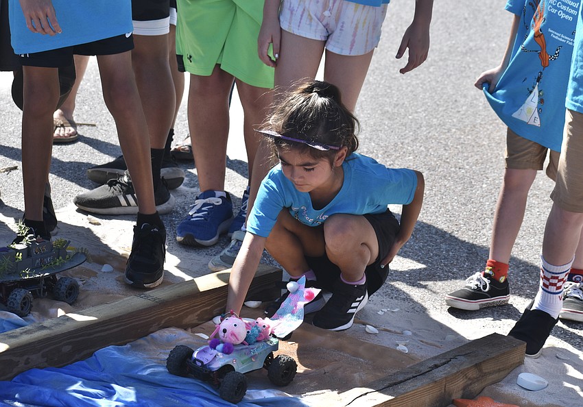 7-year-old Charlotte Runnalls of Purrfect Mercats gets ready to race her 