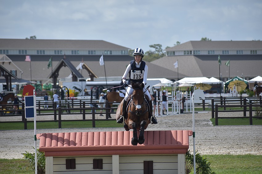 Cassie Sanger of the U.S. negotiates a jump on Fernhill Zoro
