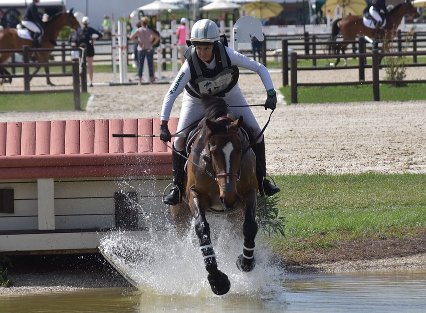 Sara Kozumplik hits the water over a jump with Rock Phantom at TerraNova.