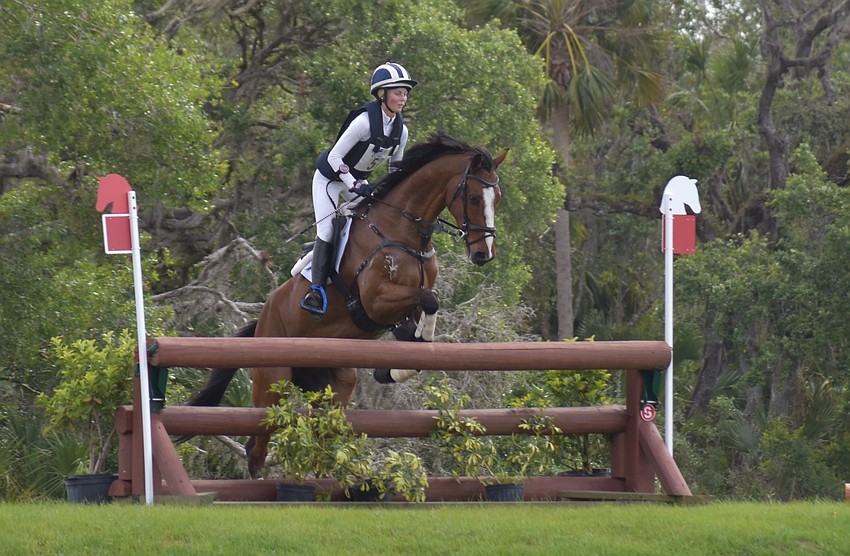Cassie Sanger goes skyward above Redfield Frye.