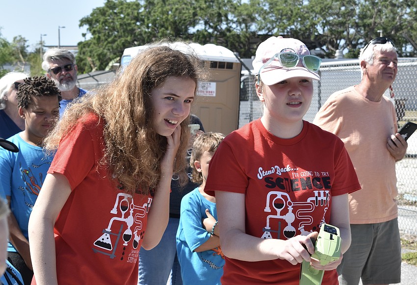 12-year-old Mikaela Tereshkov and 13-year-old Addison Hartley of Lopsided Squids navigate the challenge track.